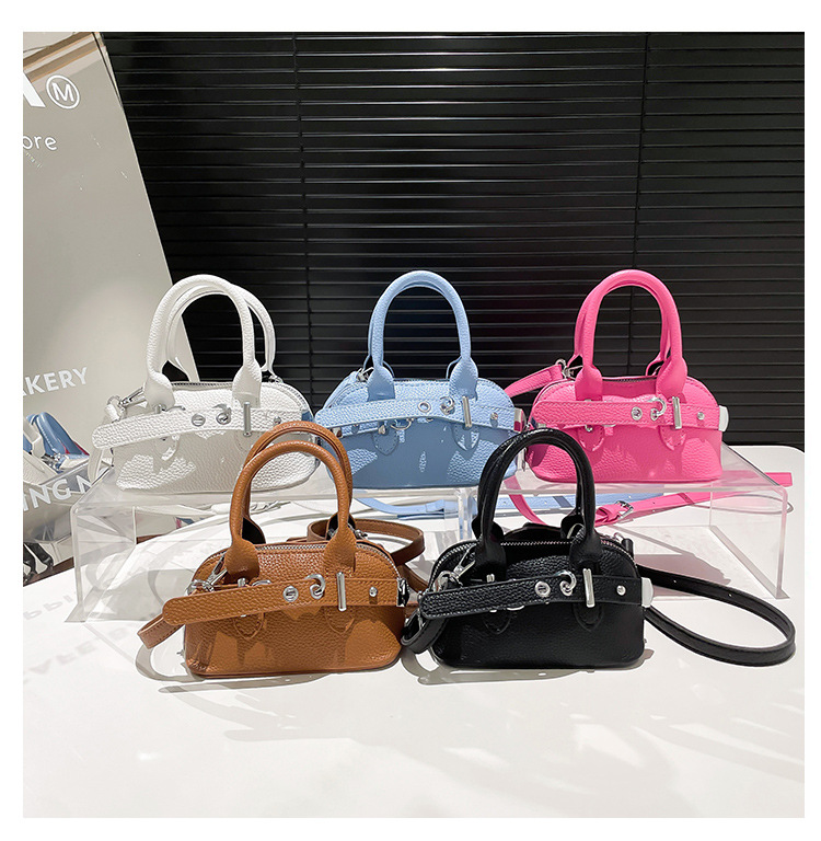 A simple and individual hand-held shell bag, a new Spring/Summer 2025 niche fashion casual shoulder bag, a trendy and stylish crossbody bag undefined