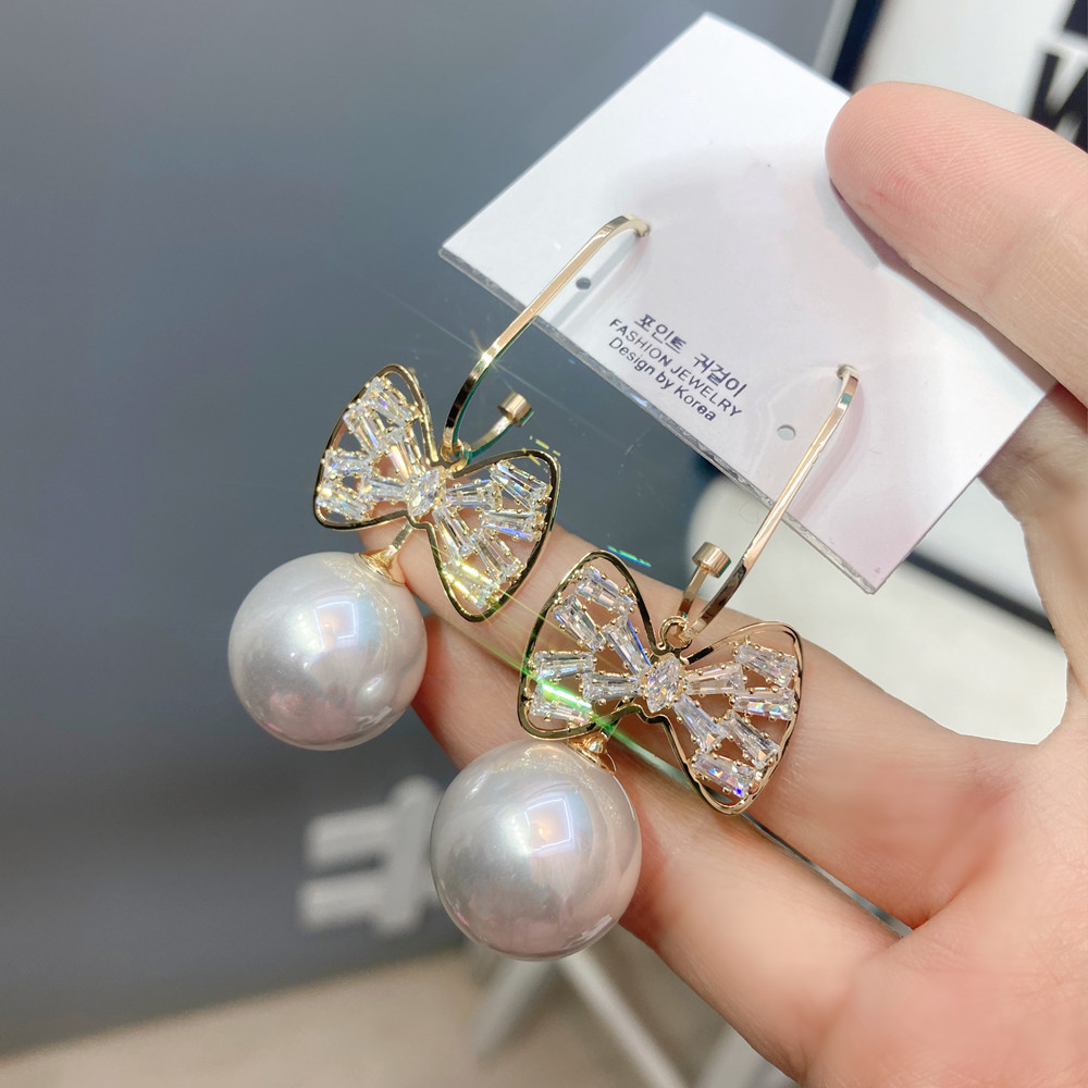 Korean Bowknot Pearl Earrings display picture 3