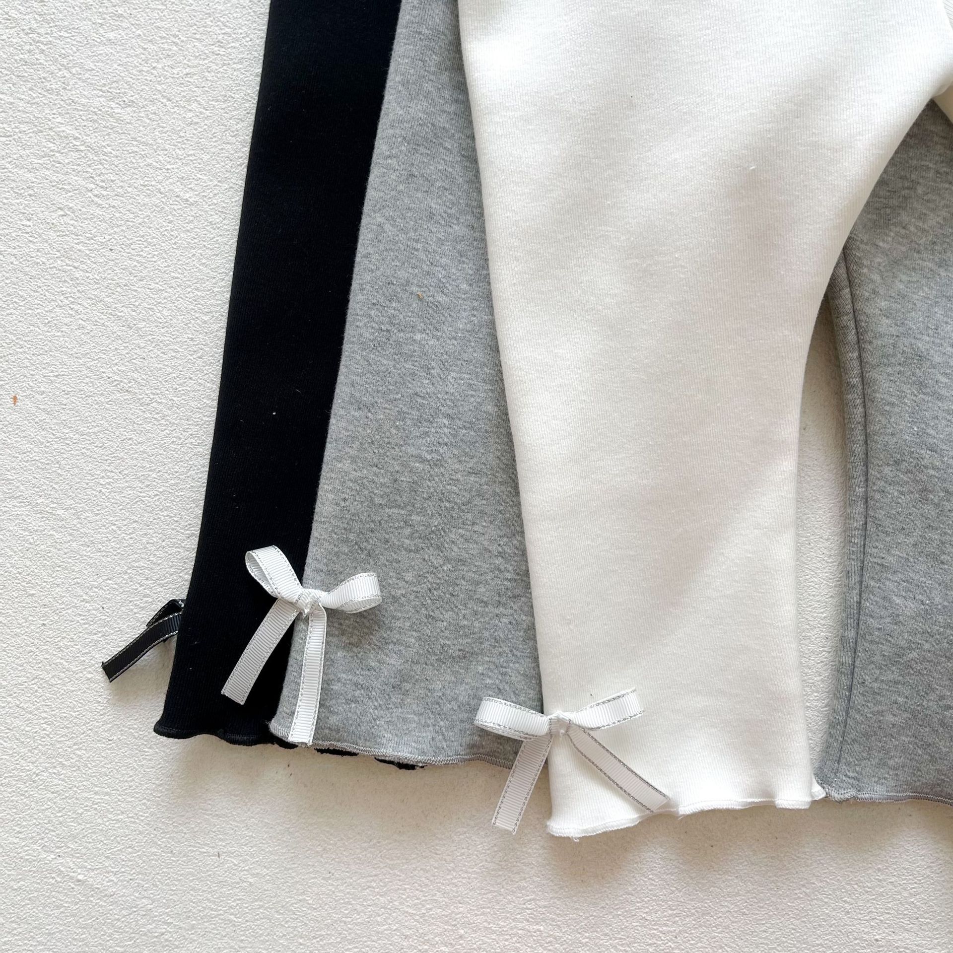 Las polainas de las muchachas invierno estilo coreano color sólido bowknot Bebé Pantalones casuales espesado cálido bebé niñas polainas de algodón