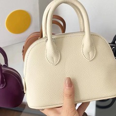 トップ層牛革純皮クラシック百合ファッションミニ貝殻バッグシンプルで軽量なシングル肩斜め掛けファッション女性バッグバッグ
