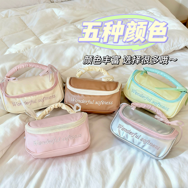 Bolsa de maquillaje de arco de corazón de niña portátil, bolsa de almacenamiento portátil, bolsa de lavado impermeable de gran capacidad