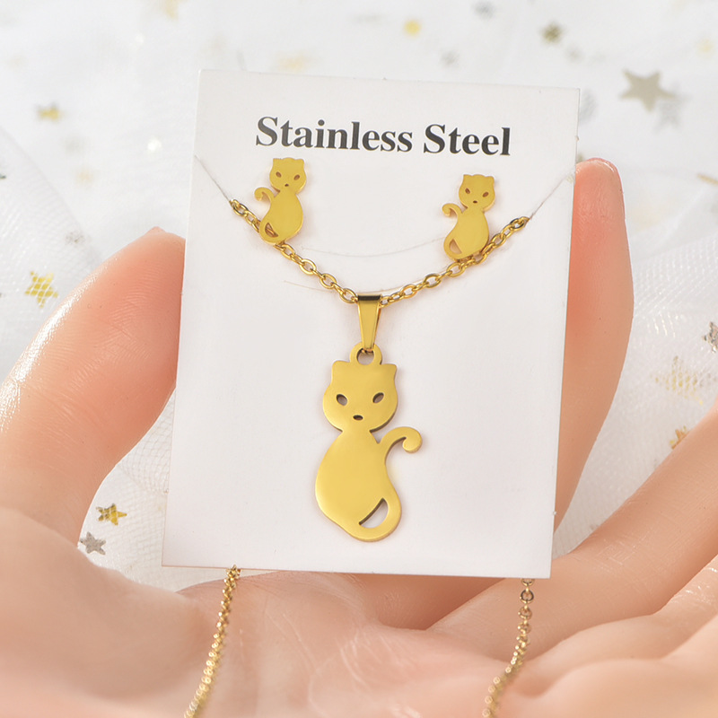 INS transfronteriza de acero inoxidable chapado en oro no es fácil de desvanecerse animal amor collar pendientes amor joyería de titanio traje de acero