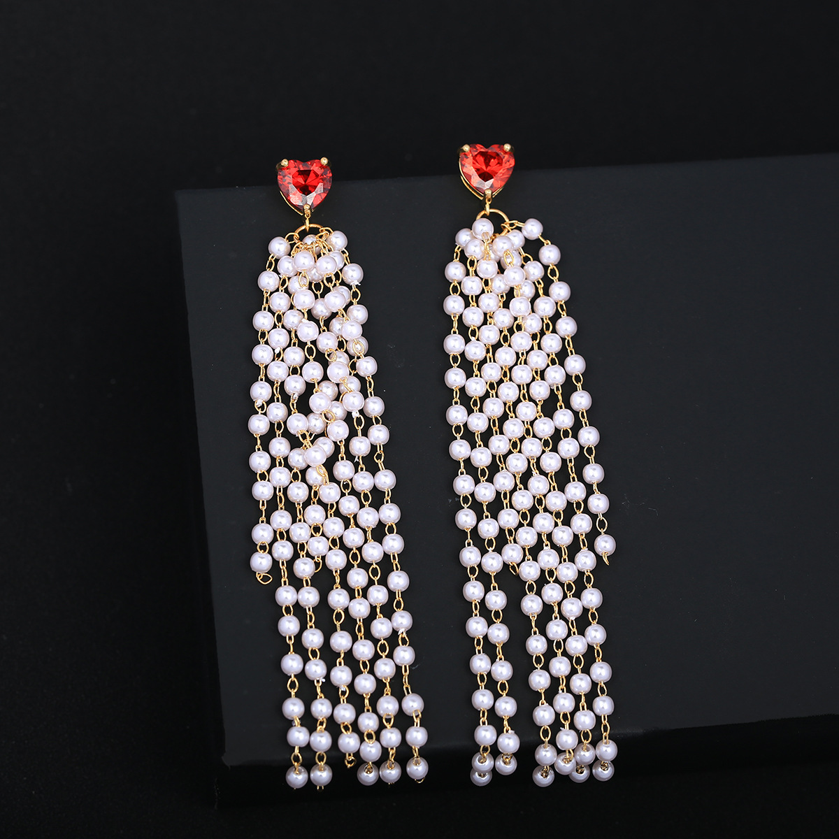 Fashionable earrings pearl with tassels with zircon heart shaped