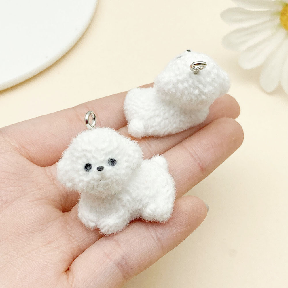 머리를 오른쪽으로 누워 있는 흰색 수지 무리 동물 1마리 강아지 비숑 프리제 32x29mm-22931-11.55g