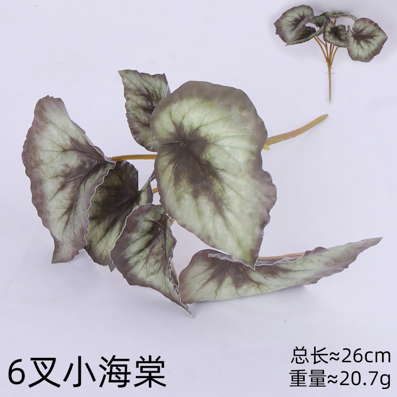 Simulación de plantas verdes flores falsas mano