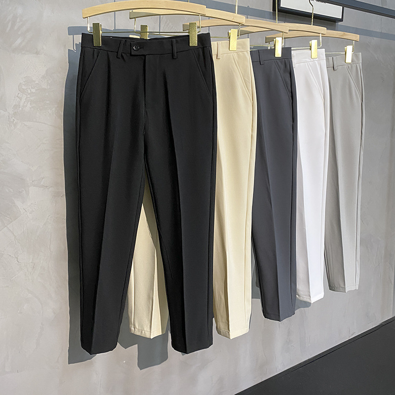 Pantalones de traje pequeño drapeado de primavera y verano para hombres Pantalones rectos delgados pantalones de traje recortados de moda para todo el partido más el tamaño pantalones casuales calientes