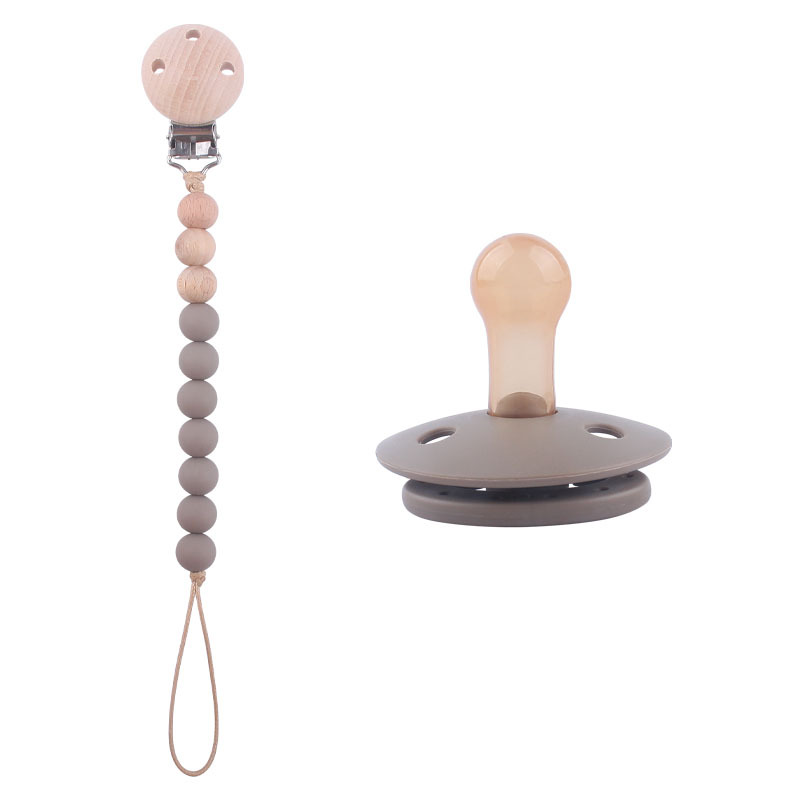 Nuevo bebé Haya clip anti-gota cadena calmante bebé silicona pezón mordedura pegamento molar pezón cadena traje