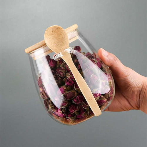 Manufacturer wholesale transparent glass snack storage jar with wooden lid glass big belly cereal sealed jar with spoon tea jar