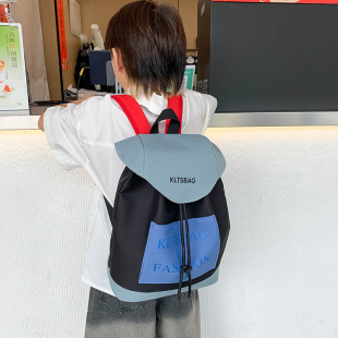 2024 new Korean version of Korean color contrast drawstring children boys and girls fashion primary school backpack wholesale