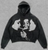 Three people smoking sweatshirts