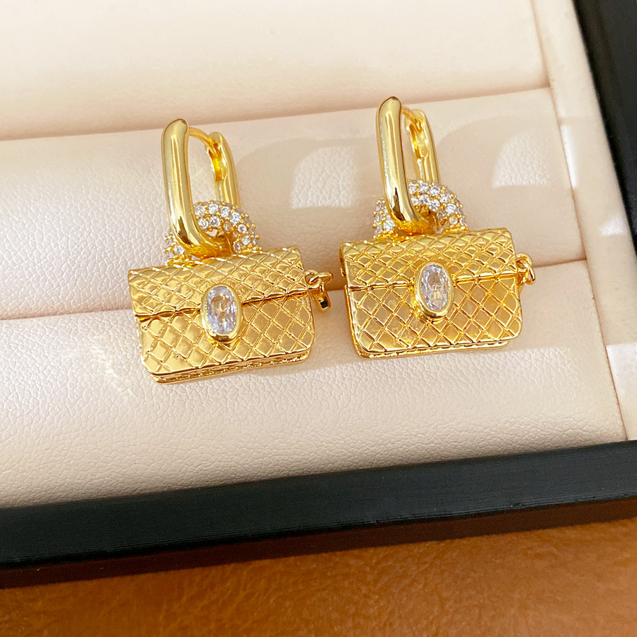 18k oro real electronite de piedra de silicio oval bolsas de orejas personales pendientes de nicho ligero lujo alta sensación de orejas al por mayor