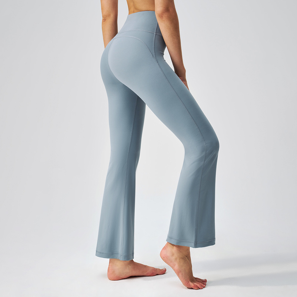 Microplaneta de cintura alta desnuda elástica pilates elástica pantalones deportivos para mujeres