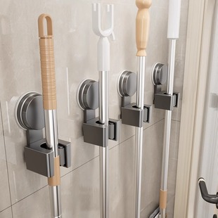 The suction cup mop wall -mounted clip bathroom door is free of punching, a tug -of -hook hook, a fixed set of storage artifacts