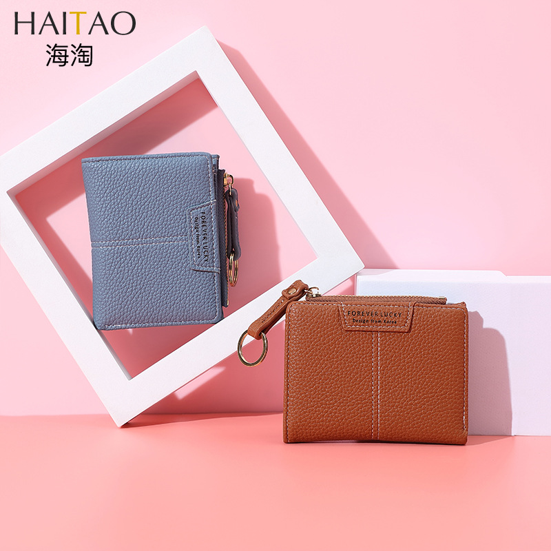 Cartera corta de mujer de color sólido de lujo ligero nicho Volkswagen gran capacidad dos carteras plegables cremallera mini bolso de cambio de mujer