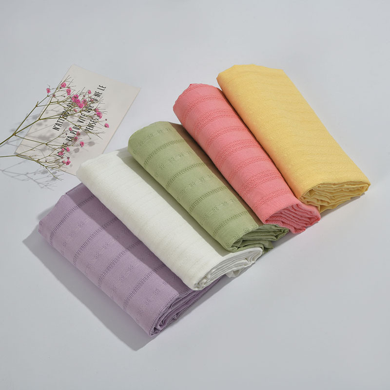 现货混纺提花布条纹菱形纹面料纯色几何图形提花面料服装辅料批发