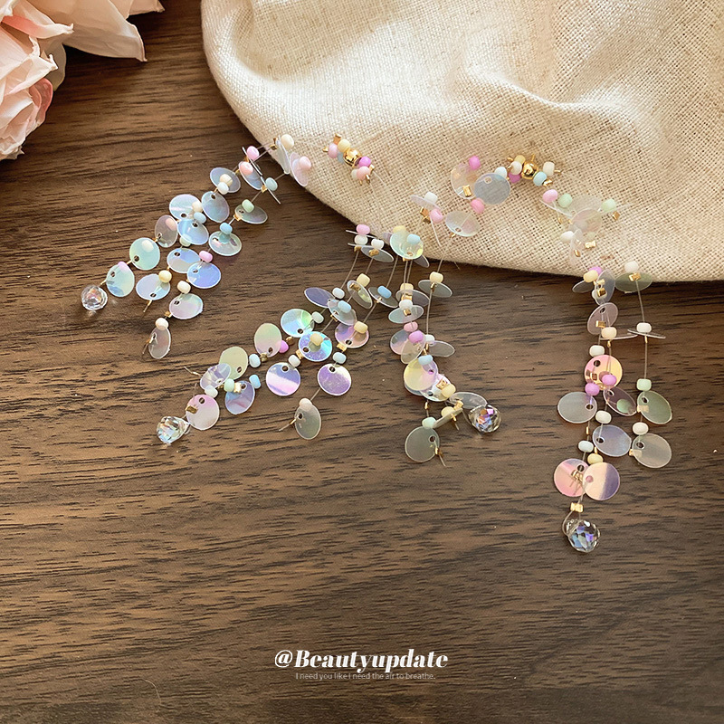 Pendientes de borla de cuentas de arroz de color de dopamina con aguja de plata Nuevos pendientes de todo fósforo Pendientes de niña dulce Sensación avanzada de nicho