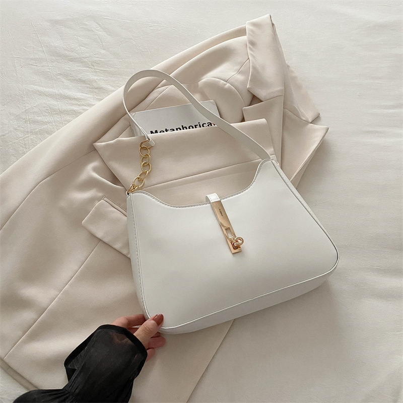 Bolso de alta sensación 2024, nuevo bolso de moda, primavera y verano, simple y versátil bolso de hombro de transporte, bolso de nicho de textura bajo la axila