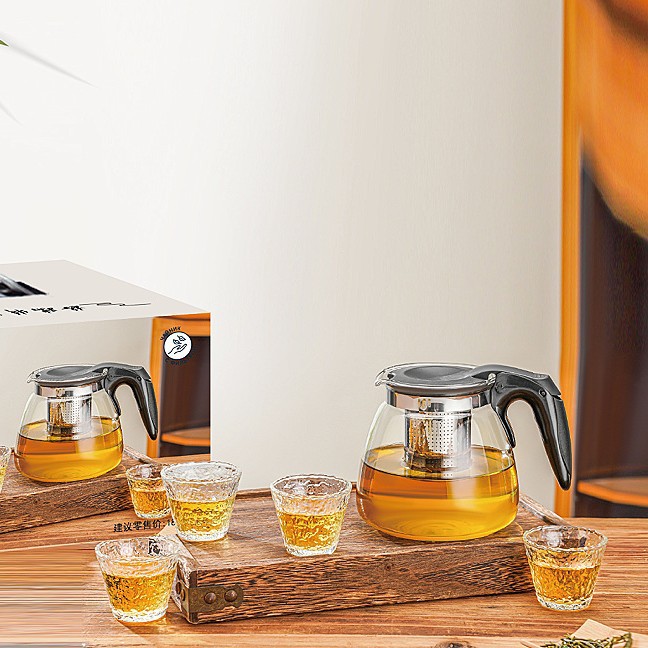 Traje de tetera de vidrio suministro directo de agua de fábrica de cinco piezas de vidrio resistente al calor para el hogar en stock juego de té de regalo al por mayor