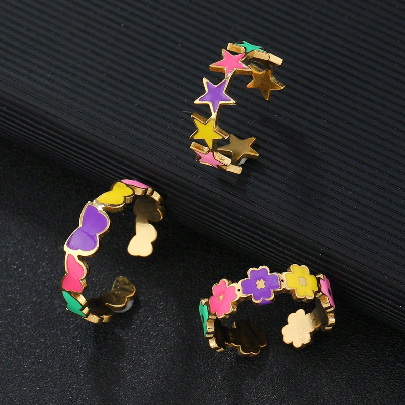 Joyas de acero inoxidable transfronterizas frescas gotas de aceite de color estrella de pentaco flores mariposa dopamina abierta anillo de acero de titanio