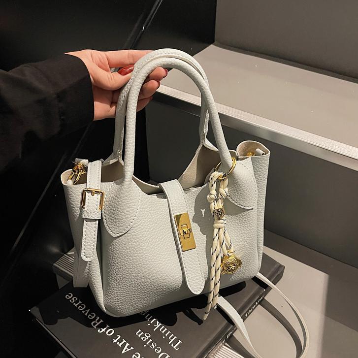 Bolso de cesta de verduras simple de comercio exterior para mujer 2025 nuevo bolso de hombro casual salvaje de moda bolso de cubo de aire extranjero