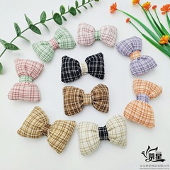 新しいアイデアの韓国版の格子は綿の蝶結びを満たしてDIY秋冬の服の部品を飾って靴の装飾の補助材料を包みます。