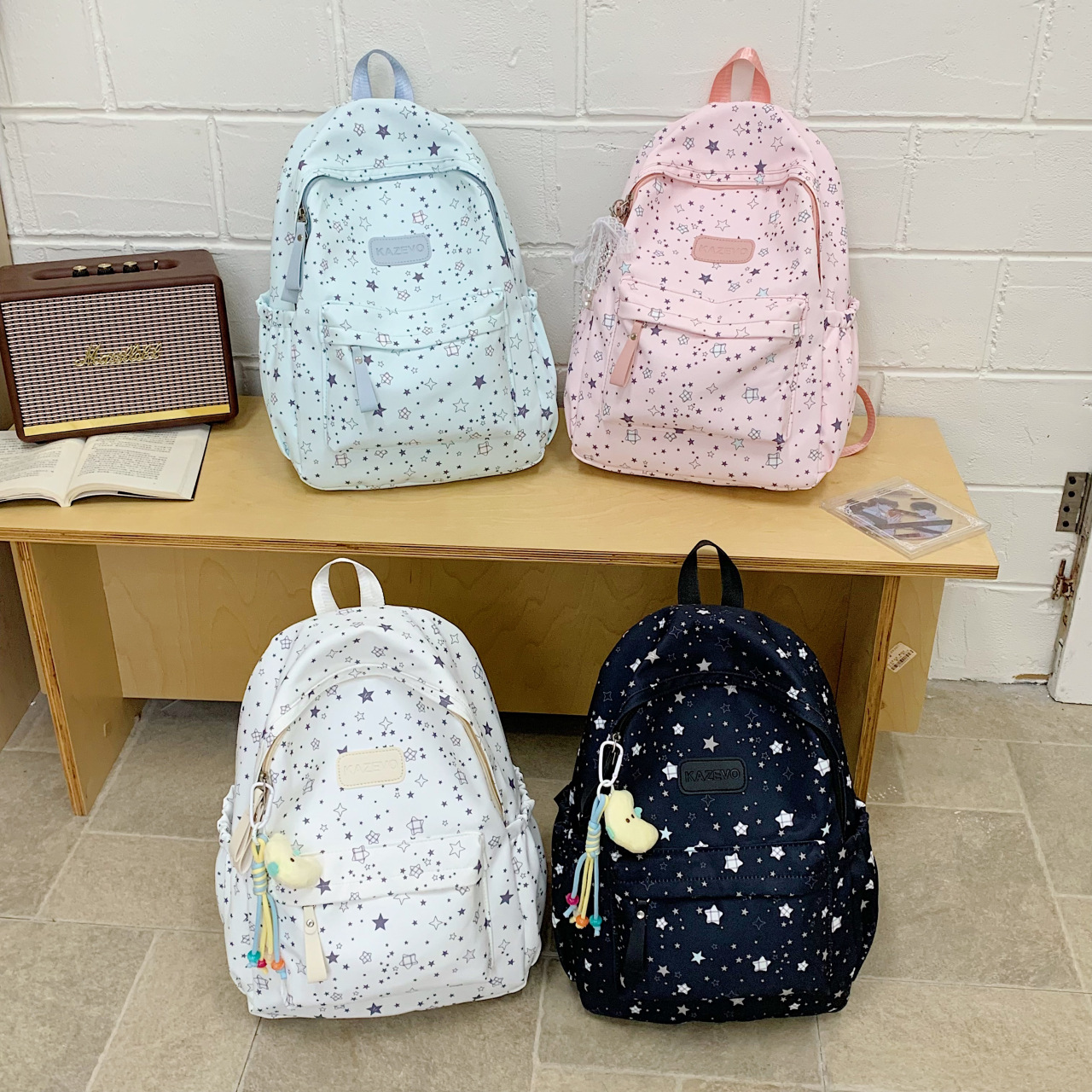 Star-printed large-capacity backpack for middle and high school students, stylish and lightweight for commuting, traveling, and casual use