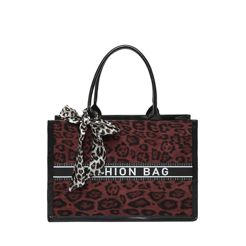Primavera nueva moda estampado de leopardo de alta capacidad bolso de hombro de estilo extranjero bolso de viaje de nicho para mujeres