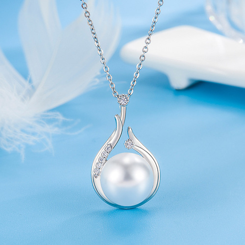 Live broadcast new products hot sale set simulated freshwater pearls and shell beads full of diamond earrings for women luxury ear hook pendant necklace