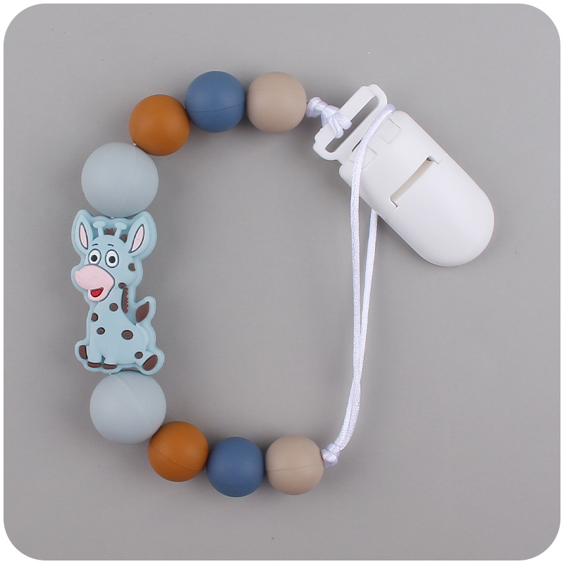 Nuevo bebé suministros chupete cadena creativa de dibujos animados jirafa silicona bebé mordedura cadena anti-caída molar