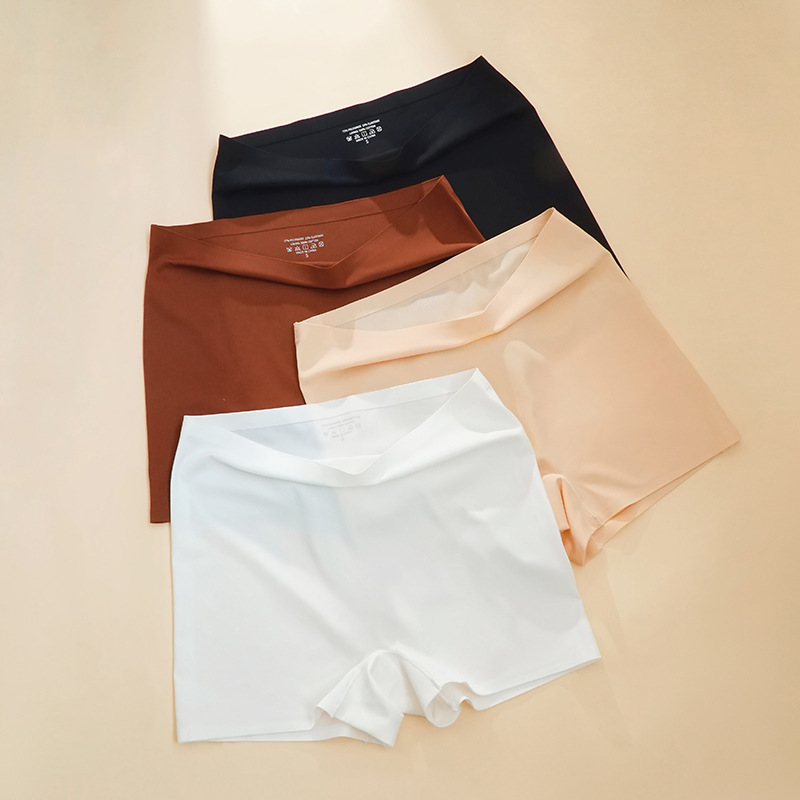 Calzones bóxer de cintura alta para mujer, estilo europeo y americano, ropa interior sin costuras antiexposición, calzones de seguridad de seda helada con control de abdomen dos en uno.