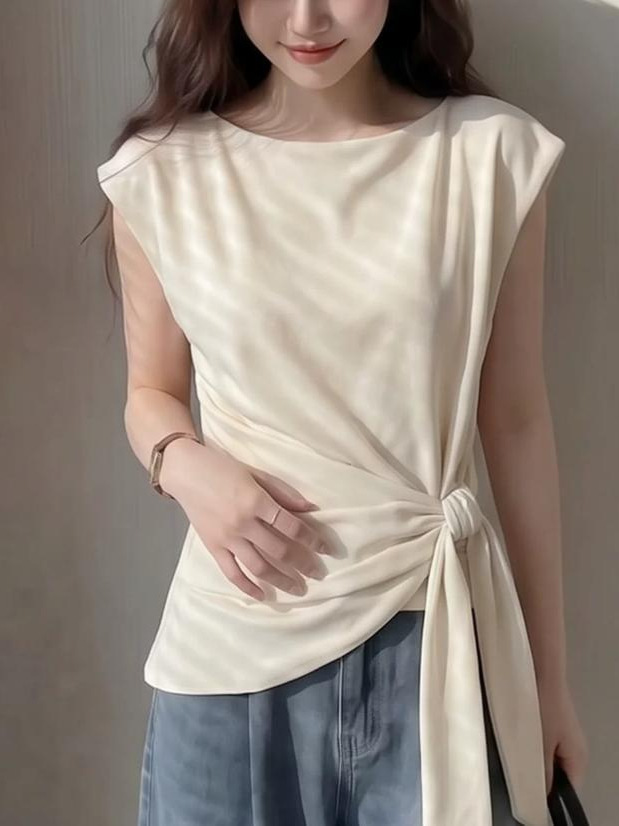 Áo thun nữ không tay thắt lưn bất quy tắc, phối dây rút eo, form ôm nhẹ — trắng ngà