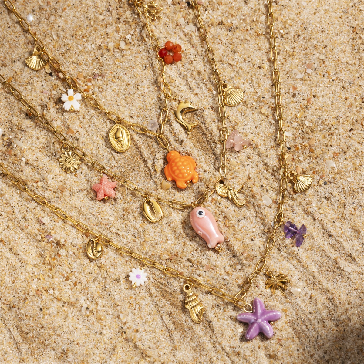 Tina transfronteriza mar de arena viento de acero inoxidable no decolor tortuga de peces de cerámica pulsera de acero de aluminio primavera y verano mujeres al por mayor