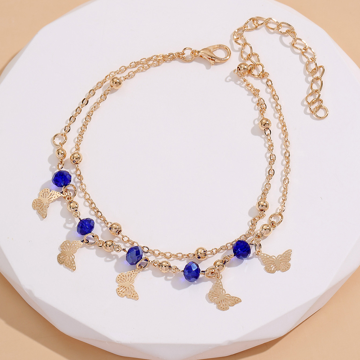 Nuevo cross-border de playa europea y americana pulsera pulsera mujer diamantes huecos flores mariposas hechas a mano pie diseño famoso