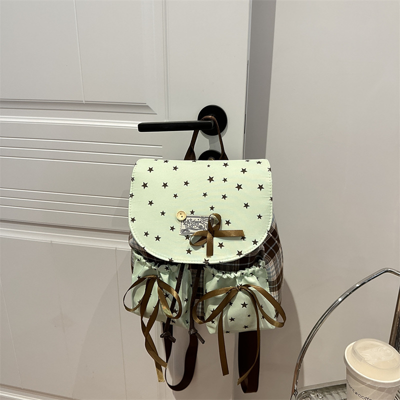 Arco ondulado coreano ins estilo extranjero mochila multifuncional dulce para estudiantes en clase mochila universal