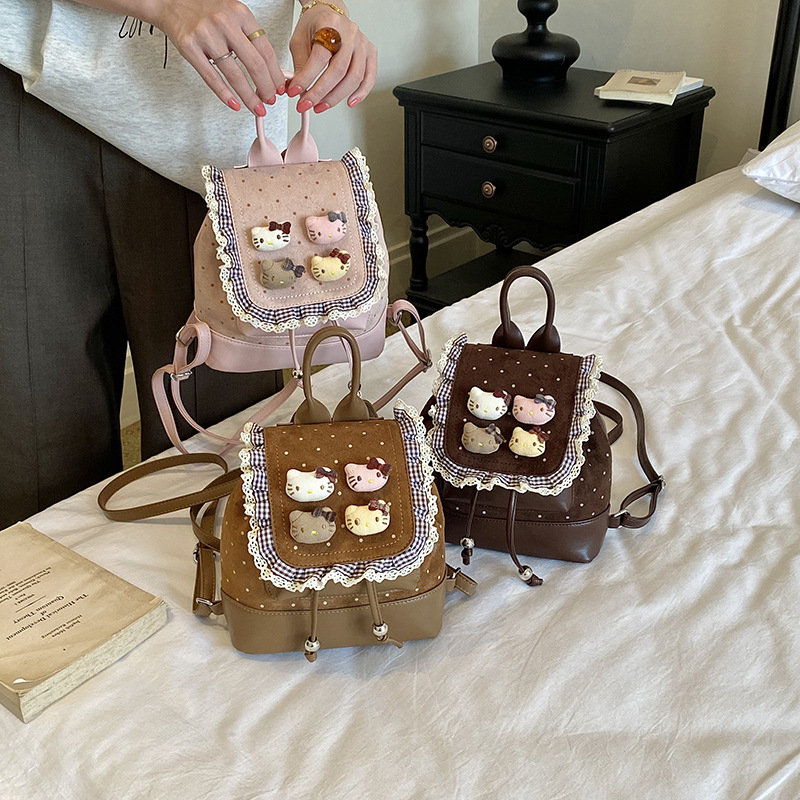 Sweet lace-trimmed girls' backpack with cute cartoon kitty design, new children's travel backpack