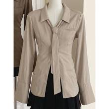 条纹衬衣女2025新款春秋季设计感慵懒风上衣长袖法式收腰显衬衫