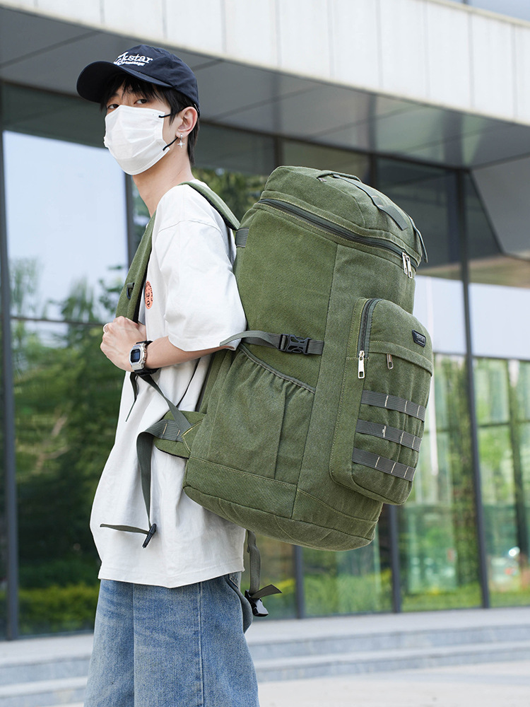 Mochila de lona resistente al desgaste transfronteriza de gran capacidad multifuncional mochila de viaje al aire libre práctica bolsa de montaña fábrica directa