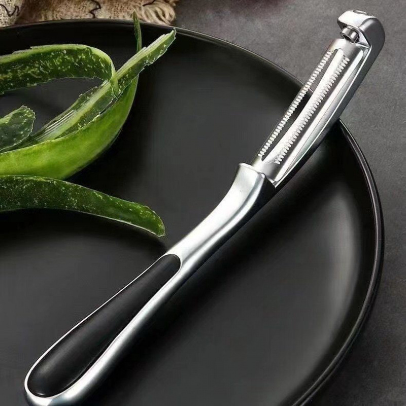 ドイツのステンレスの皮むき刀の台所の家庭用皮むきの神器の果物の野菜の果物はステンレスの皮むき刀を削ります。|undefined