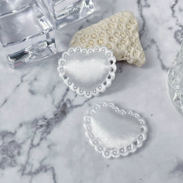 2 small white satin hearts