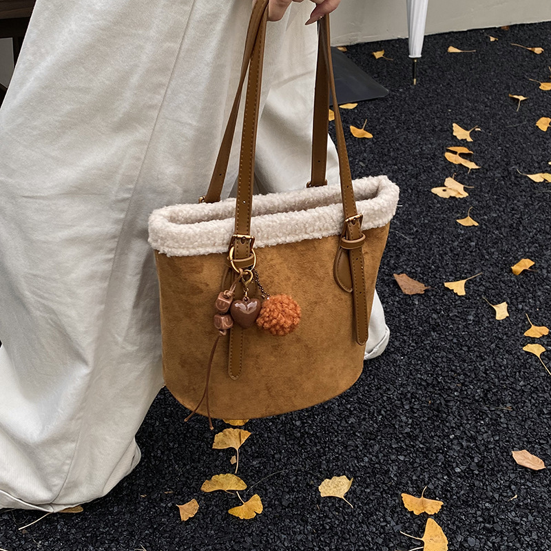 Bolsa de seda retro de alta calidad para mujeres 2025 nueva bolsa de cubo portátil de gran capacidad, bolso de hombro de seda