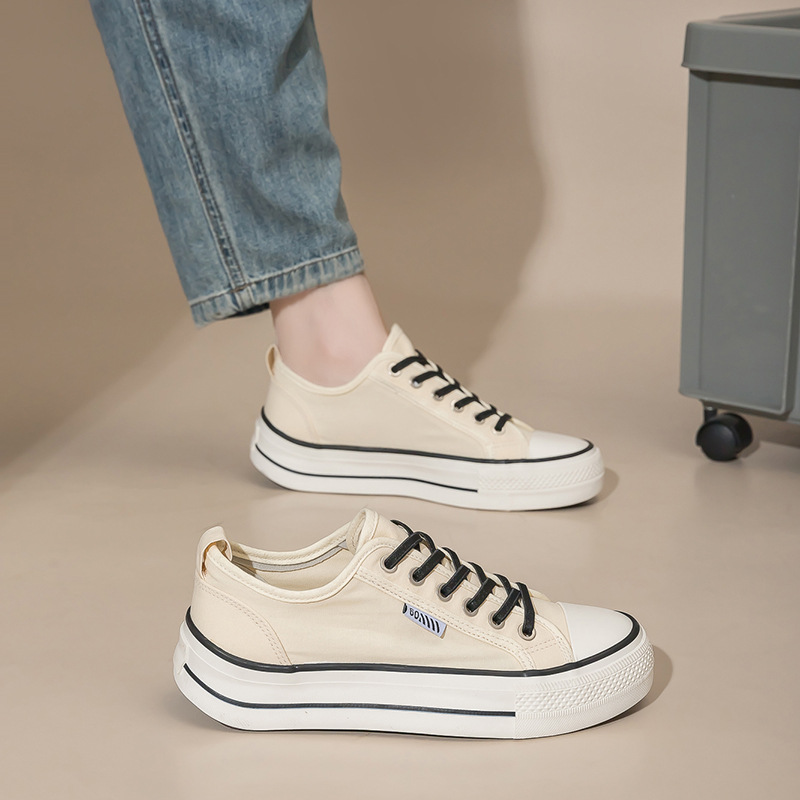 2026 nuevo estilo de moda zapatos de lona de altura de suela gruesa para mujeres zapatos de moda retro más estudiantes zapatos de lona casuales universales