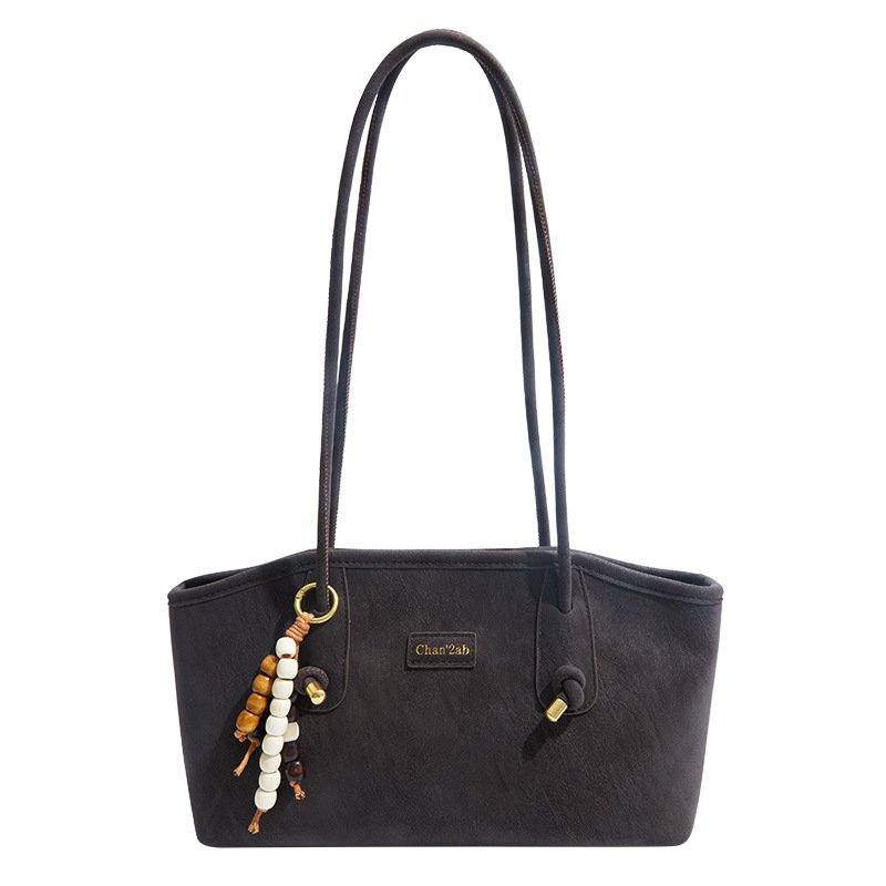 Bolsa de hombro casual coreana de nicho retro simple bolsa de brazo de viaje para mujeres 2025 nueva moda bolsa de mano