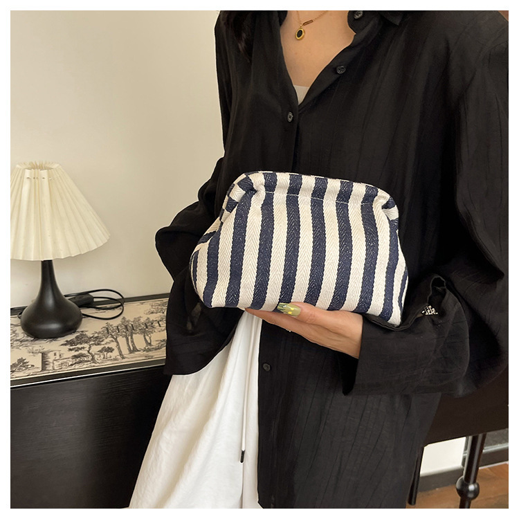 New cross-border fashion color-blocking striped cosmetic bag, women's loose change mobile phone storage bag, trendy and niche cloud clutch undefined