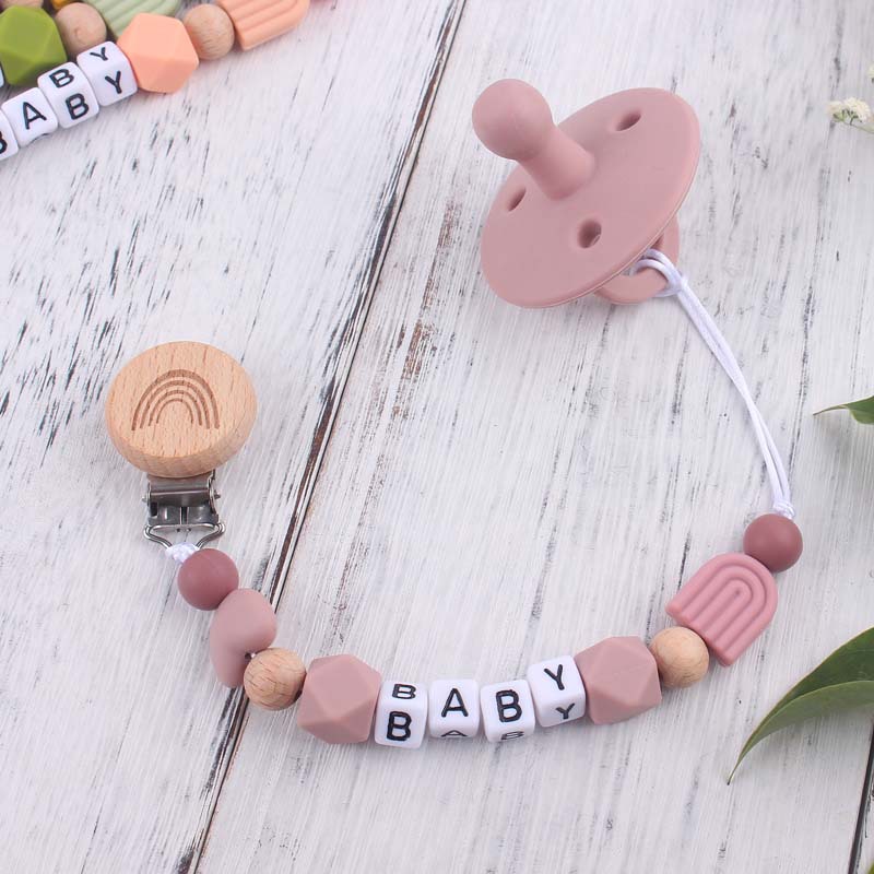 Nuevo bebé suministros de dibujos animados Arco Iris chupete clip calmante bebé Arco Iris silicona mordedura molar chupete cadena