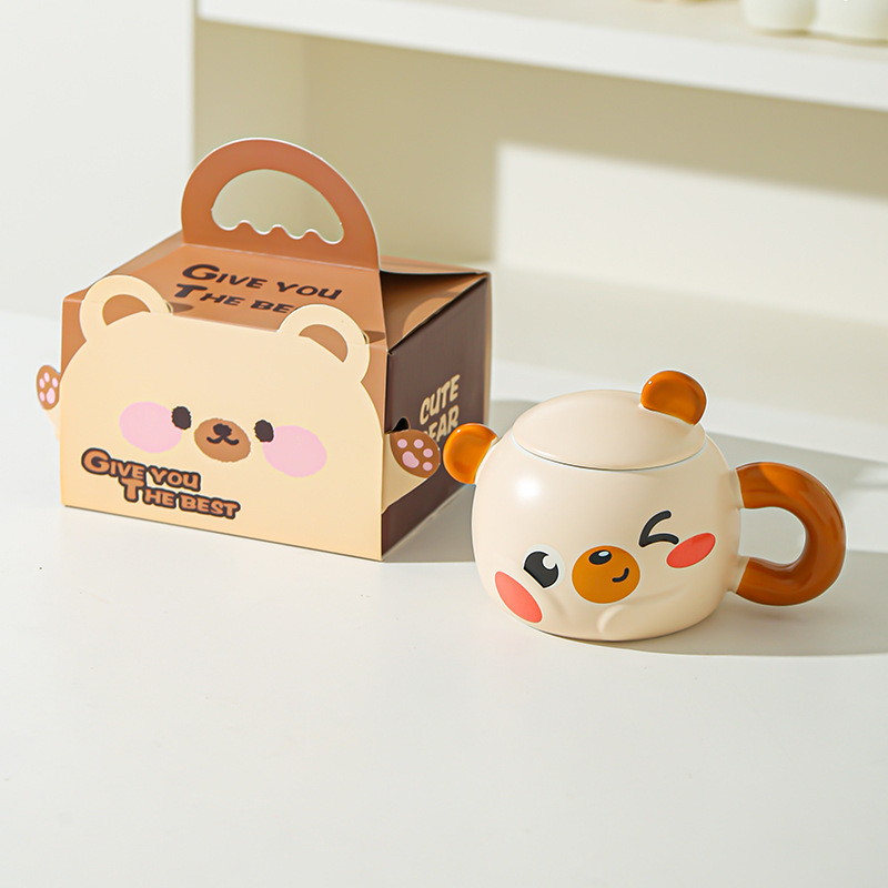 Taza de cerámica creativa de dibujos animados con tapa para desayuno casero de pareja de niños de alto valor de cara para acompañantes de regalo de taza
