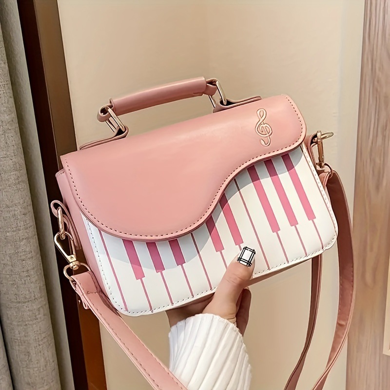 Borsa a spalla donna con ricamo note musicali e piano_voghion.com