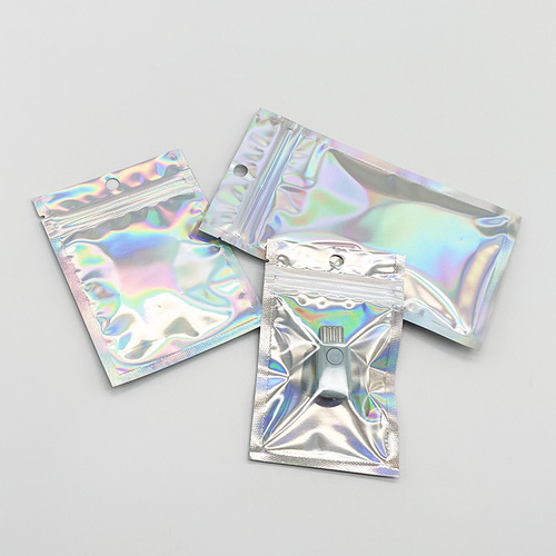 Manufacturer supplies laser yin and yang ziplock bags, stickers, cards, rainbow bags, brooches, jewelry, mobile phone cases, packaging bags