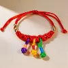 Three button five -color line red rope