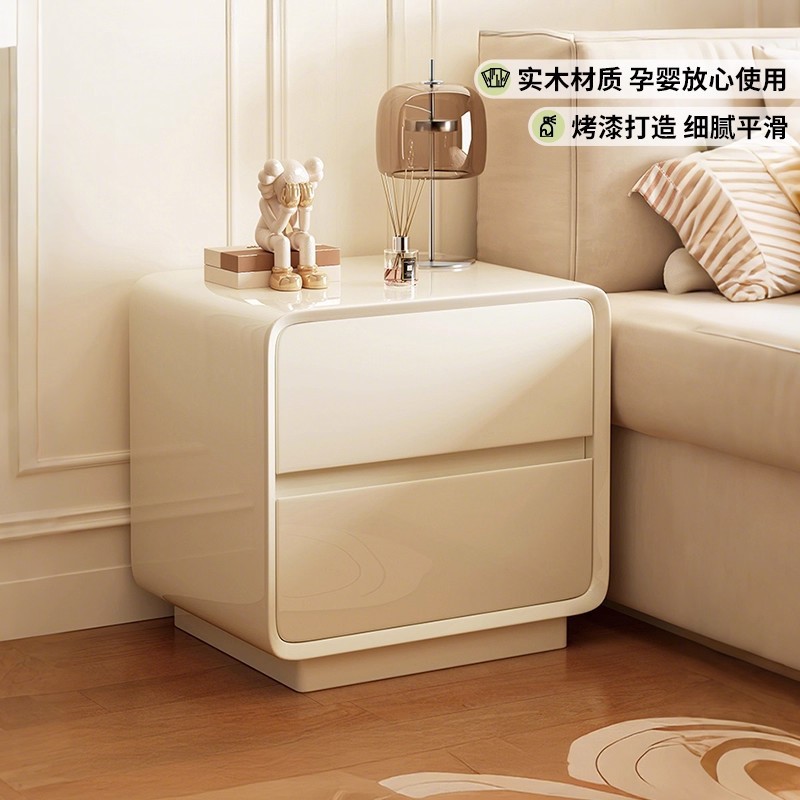 Mesa de cabezal de cama de madera maciza pintada dormitorio doméstico 2025 explosión pequeña crema de lujo ligero gabinete de almacenamiento de artículos de alto nivel