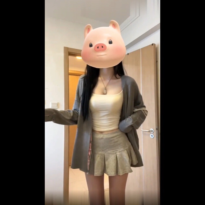 学院の風の襟のニットのカーディガンの外はカーディガンの女性の早秋の怠惰な風の高級感のゆったりした上着を掛けます。|undefined